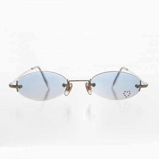 Minimalist frameless oval...