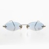 Minimalist frameless oval...