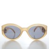 Cat-eye frame light gold...